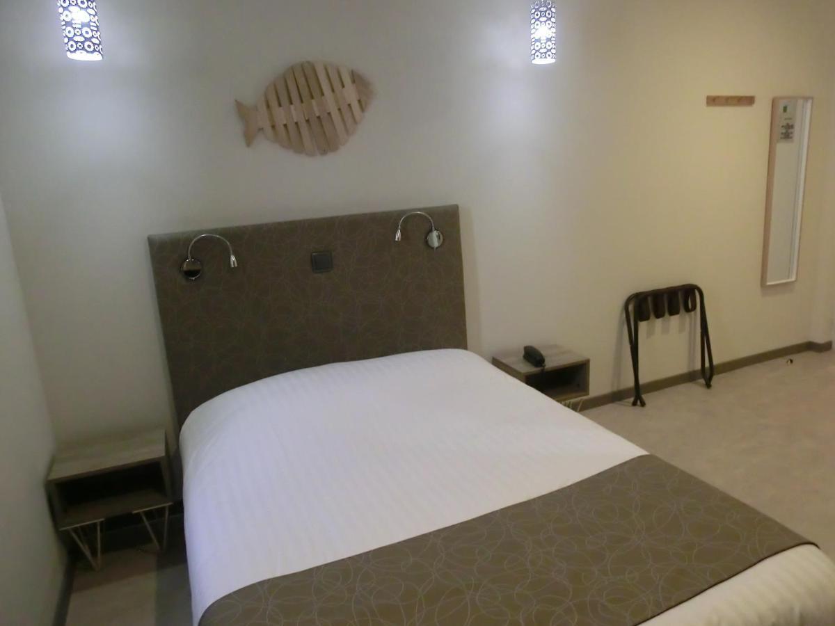 Hotel Sur Le Quai Порт Вендрес Стая снимка